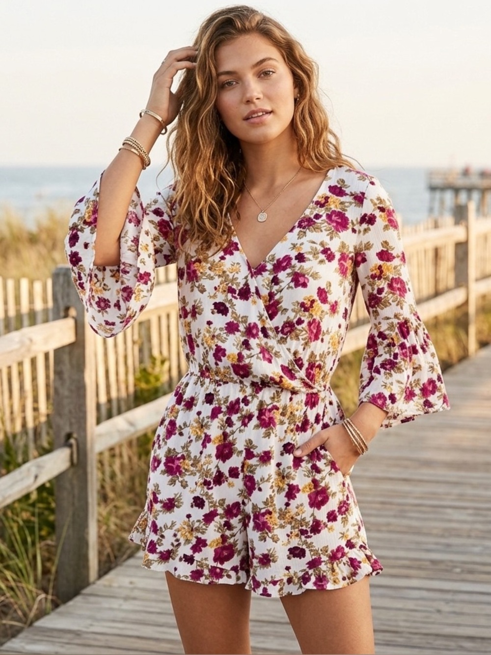 American Eagle Outfitters Bohemian Floral Bell Sleeve Romper.